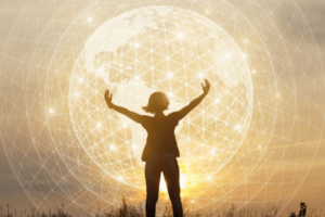 A silhouette of a woman in a field with concentric circles of internet waves surrounding a globe above her head.