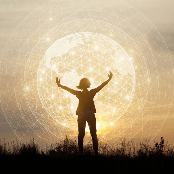 A silhouette of a woman in a field with concentric circles of internet waves surrounding a globe above her head.