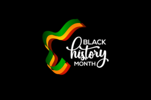 A black background that has white text in the center of it that says "Black History Month."