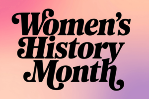 A pink, peach, and purple colored gradient background with the black text block letters reading "Women's History Month."